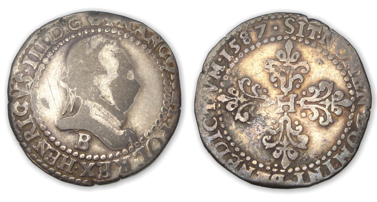 Henri III - Demi-franc au col plat 1587 B (Rouen) Henri III - Demi-franc au col plat 1587 B (Rouen)