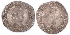 Henri III - Demi-franc au col plat 1587 O (Riom). Henri III - Demi-franc au col plat 1587 O (Riom).
