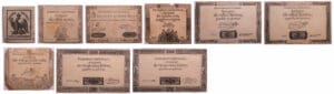 Lot de 7 assignats et un timbre de 5 centimes Lot de 7 assignats et un timbre de 5 centimes
