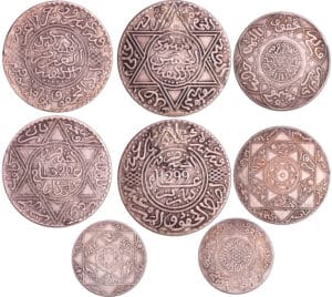 Maroc - Lot de 4 monnaies 2 1/2 dirhams 1316 (Paris), 5 dirhams 1313 (Berlin), 10 dirhams 1299 (Paris), 10 dirhams 1320 (Londres)