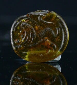 Romain - Jeton en pâte de verre (lion) - 100 / 300 ap. J.-C. Romain - Jeton en pâte de verre (lion) - 100 / 300 ap. J.-C.