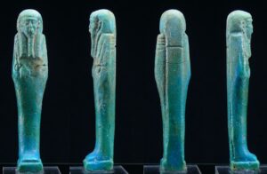 Egypte - Basse époque - Oushebti anépigraphe en fritte émaillée - 664 / 346 av. J.-C. (26ème-30ème dynastie)